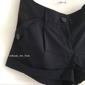 Dark navy cuffed pleated front dress shorts